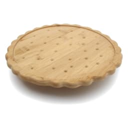 Round light brown bamboo coaster with scalloped edges and small circular indentations, resembling a biscuit, on a white back… - view 3