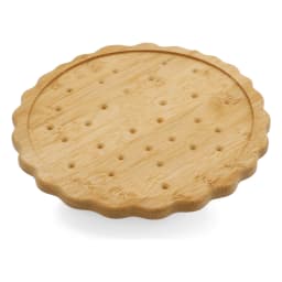 Round light brown bamboo coaster with scalloped edges and small circular indentations, resembling a biscuit, on a white back… - view 2