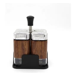 Four square glass spice jars with brown wood-grain pattern, silver tops, and a black stand on a white background. - view 3