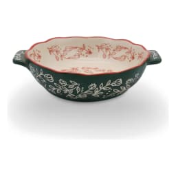 Green porcelain baking dish with handles, cream interior, and red floral patterns on a white background - view 2