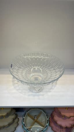 Clear glass fruit bowl with a textured pattern and a decorative pedestal base on a white background - view 3