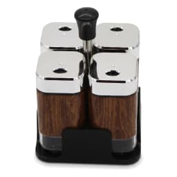 Four square glass spice jars with brown wood-grain pattern, silver tops, and a black stand on a white background. - view 2