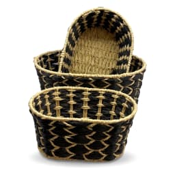 Set of three oval Khous storage baskets in black and natural beige woven pattern, stacked on a white background. - view 4