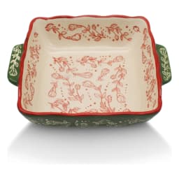 Rectangular porcelain baking dish with wavy red rim, cream interior with red floral pattern, and dark green exterior with wh… - view 2