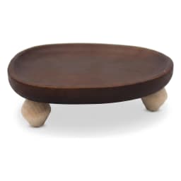 Dark brown wooden oval serving tray with three light natural wood geometric legs on a white background. - view 3