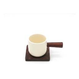 Cream ceramic mug with dark brown wooden handle and matching square wooden coaster on a white background - view 2