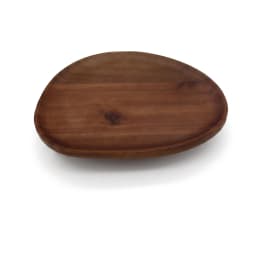 Light brown wood serving tray with an irregular oval shape, featuring natural wood grain, on a white background. - view 2