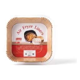 Stack of 100 brown square paper air fryer liners in clear plastic packaging on a white shelf - view 2