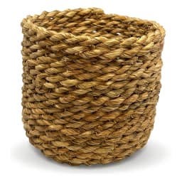 Set of three round natural light brown khous storage baskets of varying sizes on a white background. - view 2